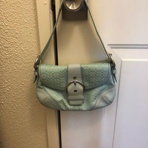 Small Coach handbag.